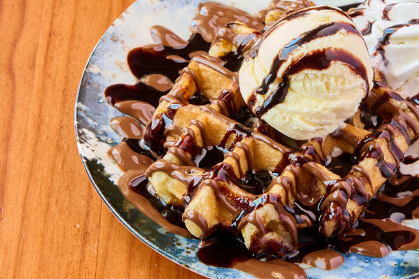 istock waffle with chocolate, cream and vanilla ice cream 1405781710