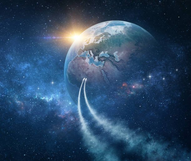 Spaceships, space probes returning home, planet Earth Spaceships traveling through galaxy, space probes passing through stars and nebulae, returning home, Western Europe, sun rising behind. Comets in outer space reaching the Earth. 3D illustration (Blender software), elements of this image furnished by NASA (https://eoimages.gsfc.nasa.gov/images/imagerecords/147000/147190/eo_base_2020_clean_3600x1800.png) reach destination stock pictures, royalty-free photos & images