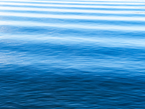 Clean and Fresh Blue hued water with gentle waves swaying