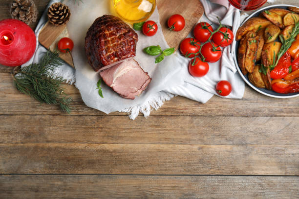 istock Festive flat lay composition with delicious ham on wooden table, space for text. Christmas dinner 1405789504