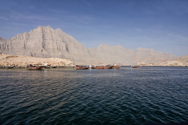 oman, dhow boats in fjords mountain, sea view. - oman beach nature stone imagens e fotografias de stock