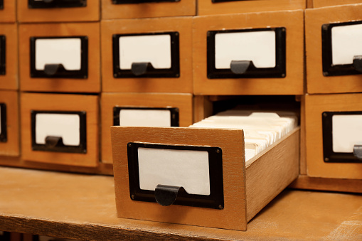 Closeup view of library card catalog drawers