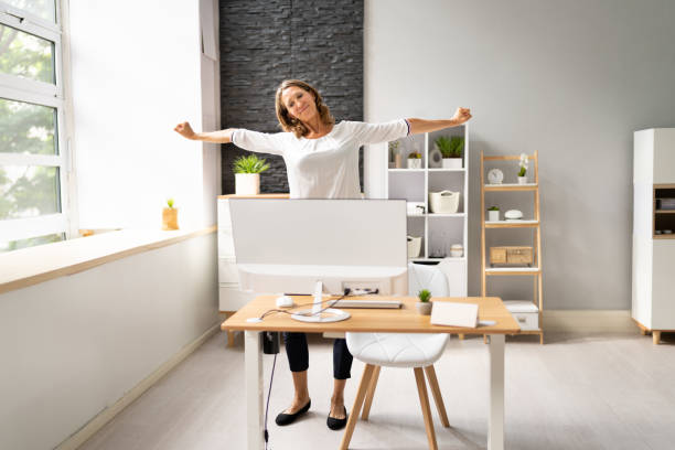 istock Businesswoman Stretching At Desk 1405791836
