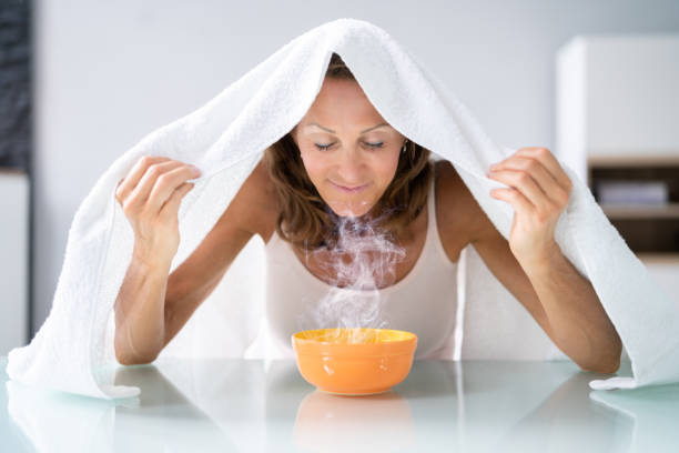 istock Woman Doing Inhalation Alternative Herbal Medicine 1405792560