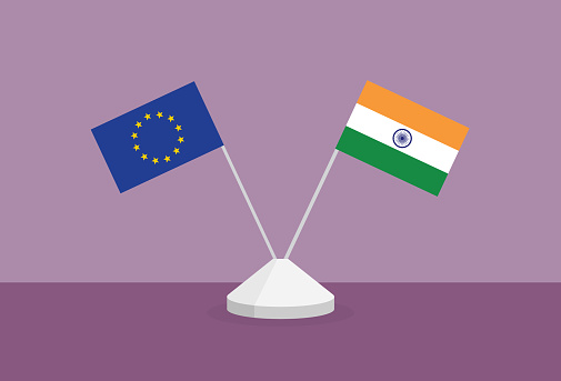 European and India flag on a table