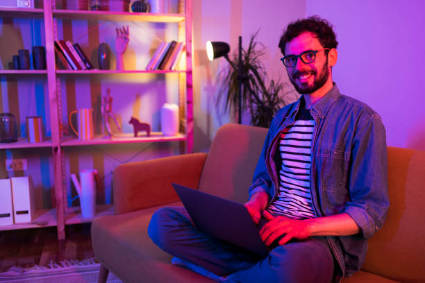istock Portrait of a young man working from home 1405793353