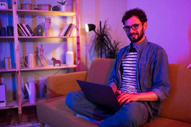 istock Portrait of a young freelancer working on the sofa 1405793360