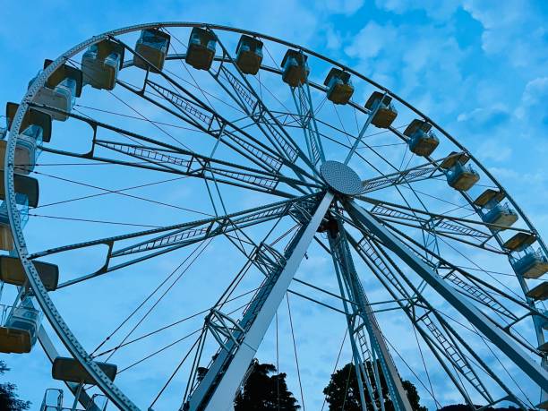 istock Ferris wheel in a children park with sky in Background 1405794378