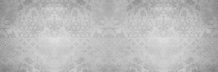 Old gray grey white vintage shabby damask patchwork tiles stone concrete cement wall texture background banner