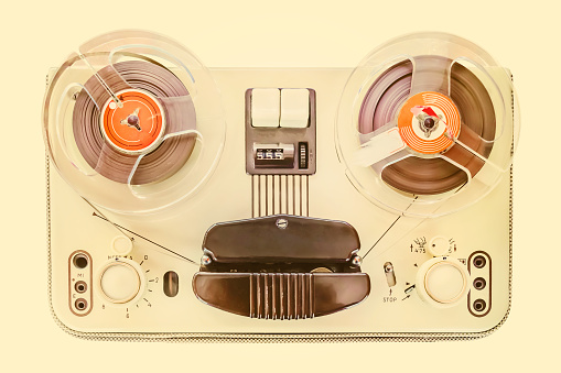 Sepia image of a vintage tape recorder from the sixties