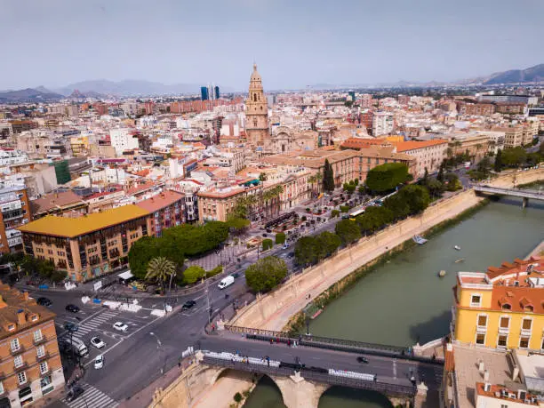 Aerial panoramic view of Murcia cityscape with bell tower of Cathedral Church of Saint Mary, Spain