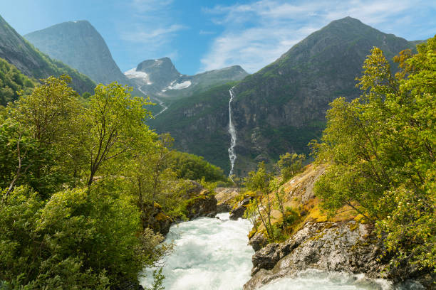 istock Waterfall stream mountain green landscape, National park Jostedalsbreen, Norway. 1405807176