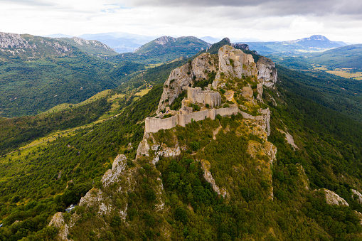 Honau - Reutlingen, Germany - September 30th, 2018: Done point of view Panorama over the Swabian Jura - Schwäbische Alb - with beautiful fairy-tale Castle Lichtenstein on top a steep rock on a sunny late summer day. Swabian Alb, Reutlingen, Baden Wurttemberg, Germany, Europe