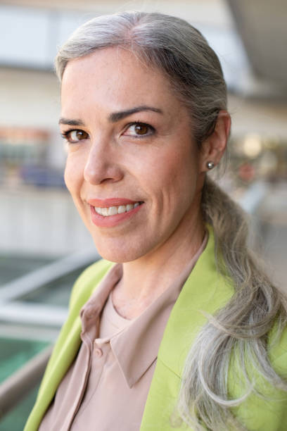 istock Attractive grey-haired businesswoman 1405810416