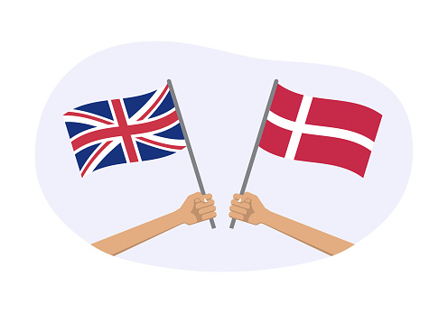 UK and Denmark flags. Danish and British national symbols. Hand holding waving flag. Vector illustration.