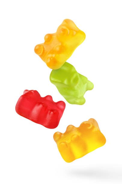 istock Flying delicious jelly gummy bears on white 1405811906