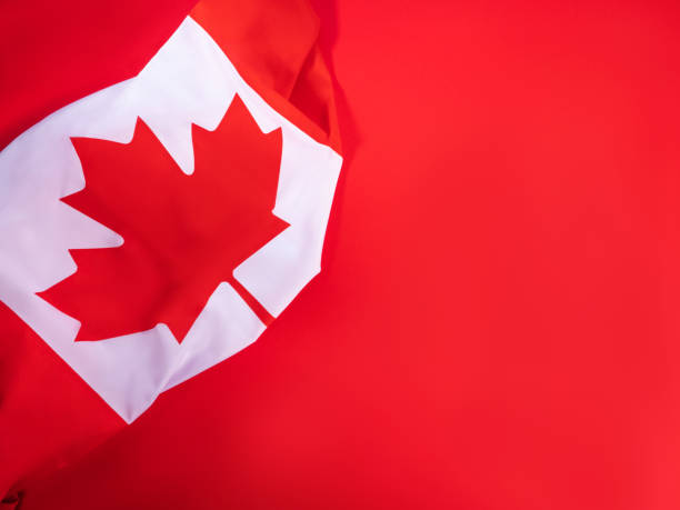 istock Canada national flag fragment on bold red background. Canada Day 1405813635