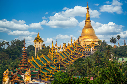 Shwedagon Pagoda attraction in Yagon City with blue sky background, Shwedagon Pagoda ancient architecture is beautiful pagoda in Southeast Asia, Yangon, Myanmar, Asian, Asia.