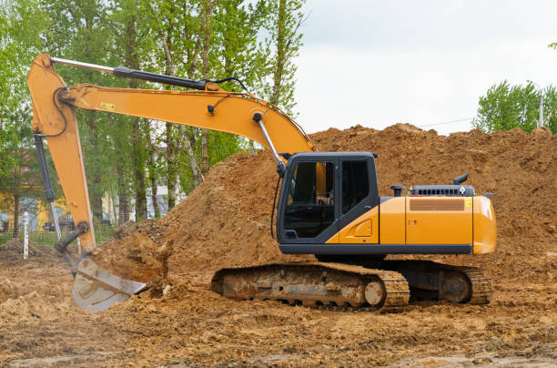 istock An excavator is digging a pit for a house. 1405818594