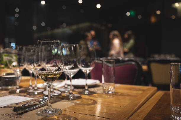 istock Tasting in a glass of white wine 1405818844