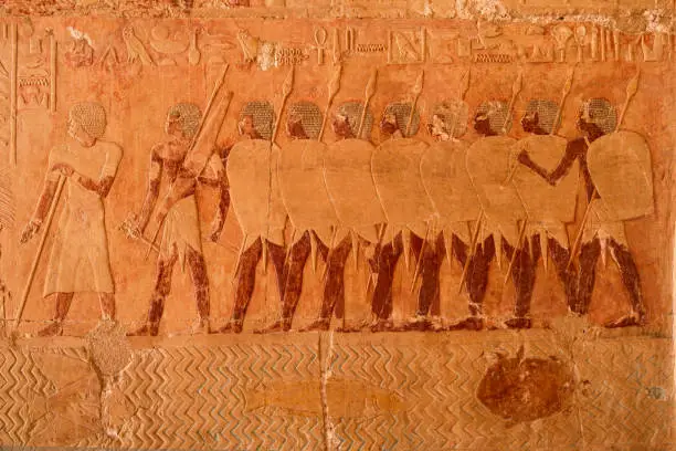 Photo of Relief showing Egyptian soldiers in the expedition to the Land of Punt. Temple of Hatshepsut. Luxor .Egypt .