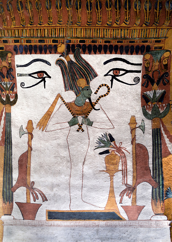 A mural of the god Osiris in the tomb of Ancient Egyptian artisan Sennedjem, Egypt.