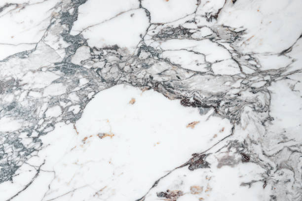 istock White marble stone texture top view. abstract pattern with grey and brown streaks for background or design art 1405822479