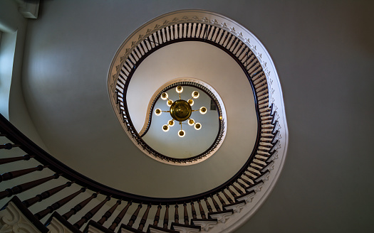 Spiral staircase within the historic Pensacola Lighthouse.  Concepts could include history, architecture, design, tourism, other.