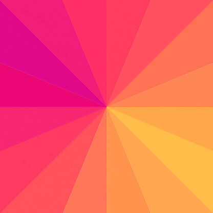 Warm colours gradient from yellow to purple, through the orange and red, made of sixteen coloured paper triangles.