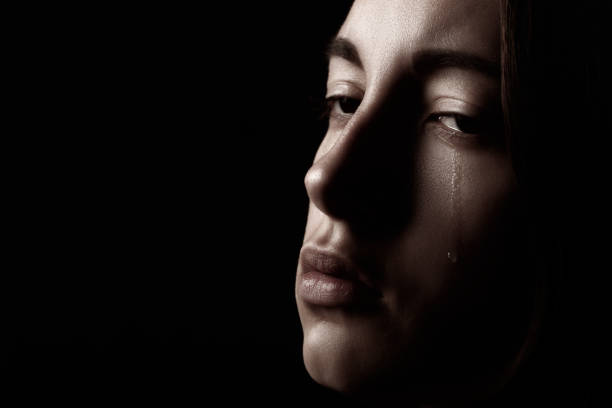 istock sad crying woman 1405835897
