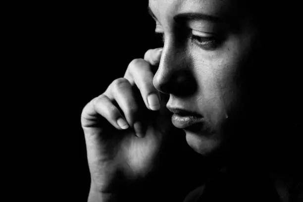 Photo of young woman crying