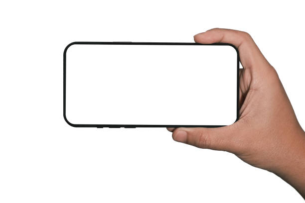istock Businessman hand holding black smartphone isolated on white background, white clipping path inside. 1405836064