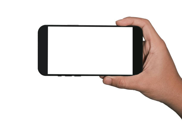 Businessman hand holding black smartphone isolated on white background, white clipping path inside.