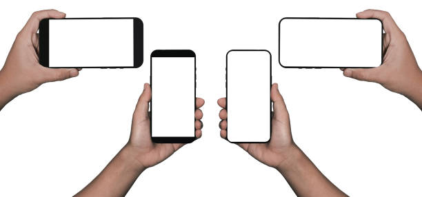 istock Businessman hand holding black smartphone isolated on white background, white clipping path inside. 1405836100
