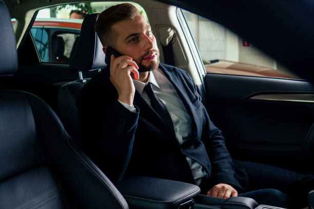 istock Young business man test drive new car 1405839626