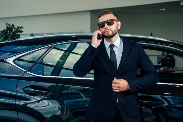 istock Young business man test drive new car 1405839639