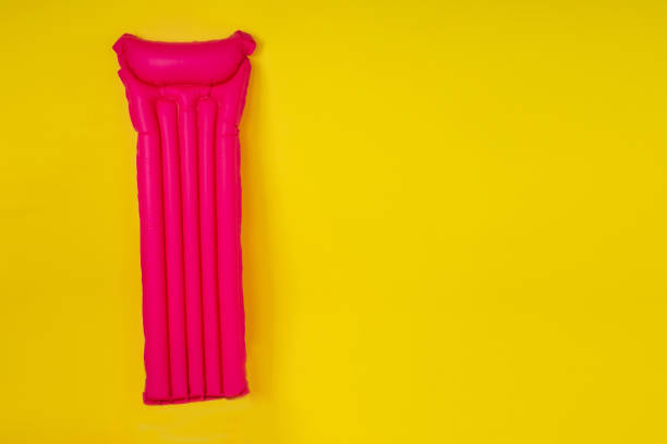 istock pink mattresses in studio yellow background mock-up copespase 1405840481