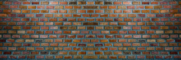 texture de mur de briques rouges que l’on trouve généralement dans les zones développées, souvent à l’arrière des bâtiments dans les villes, le fichier est un fichier de texture transparent prêt à l’emploi, un fond de mur de briques rouges a - loop ready file photos et images de collection