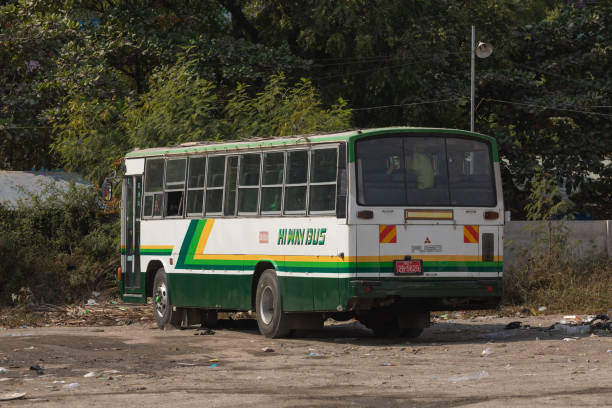 Mandalay, Burma - Dec 3121, 2019: An old bus parked at the side of the Chan Mya Shwe Pyi bus station compound, Highway Station in Mandalay