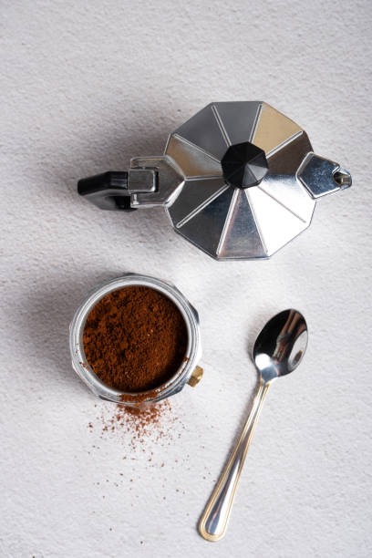 istock Top view of a disassembled geyser coffee maker with ground coffee. 1405842337