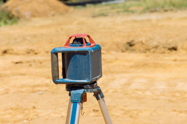 istock The construction site contractor uses level rod laser construction equipment 1405843750