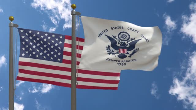 USA Flag with United States Coast Guard Flag on a Pole
