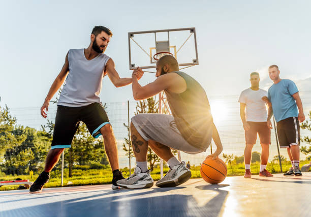 istock Man helping the injured teammate to get up 1405846809