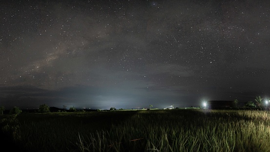 panoramic night on the mountain with a starry sky, beautiful night constellations in Indonesia