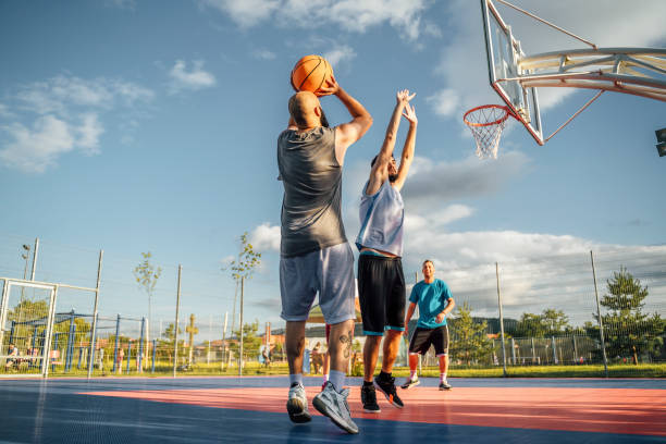 istock Men playing basketball 1405848291