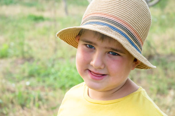 Portrait of little boy looking at camera