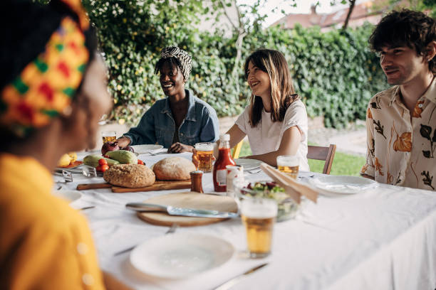 istock Friends on garden party in back yard 1405854051