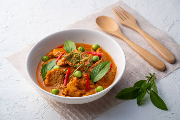 panaeng curry with pork.sliced meat in red curry paste and coconut milk - panang curry imagens e fotografias de stock