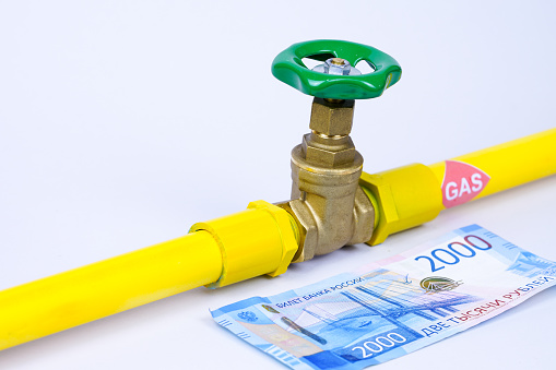 Rubles banknotes to pay for gas,gas supply for rubles concept.