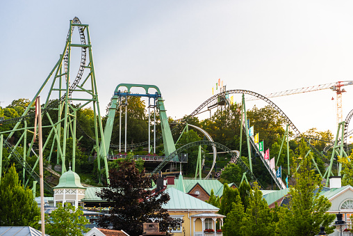 Gothenburg, Sweden - June 30 2021: View over attractions and rides at Liseberg amusement park.